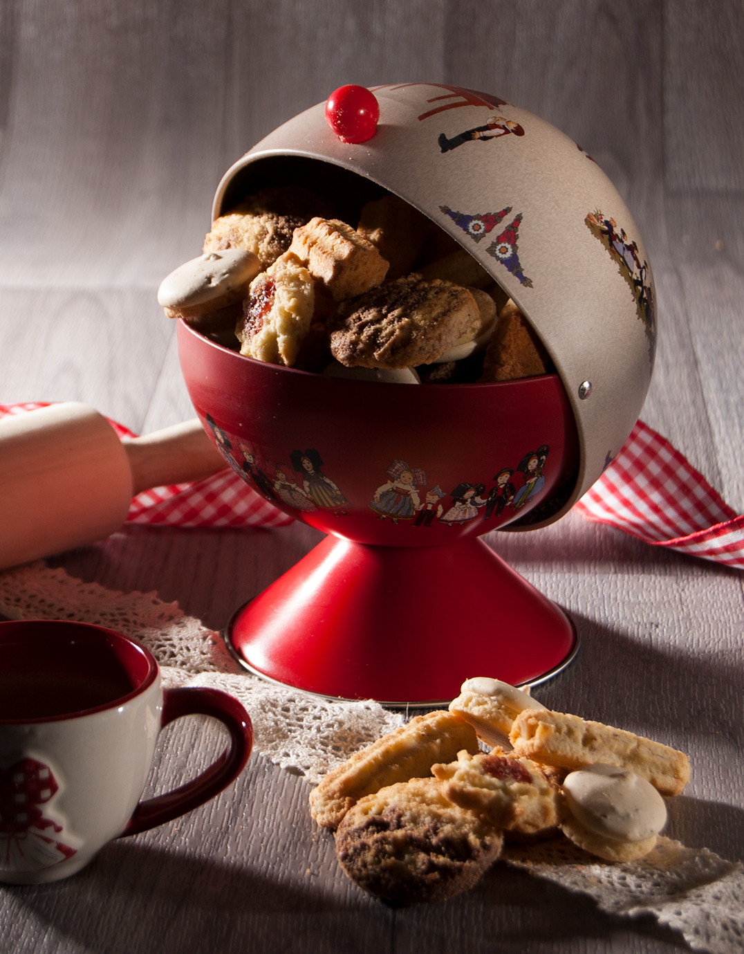 Hansi red sugar bowl filled with biscuits