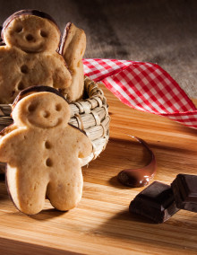 Little gingerbread man with chocolate-coated back
