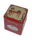 Uncle Hansi's Biscuit Factory red dispenser tin filled with biscuits